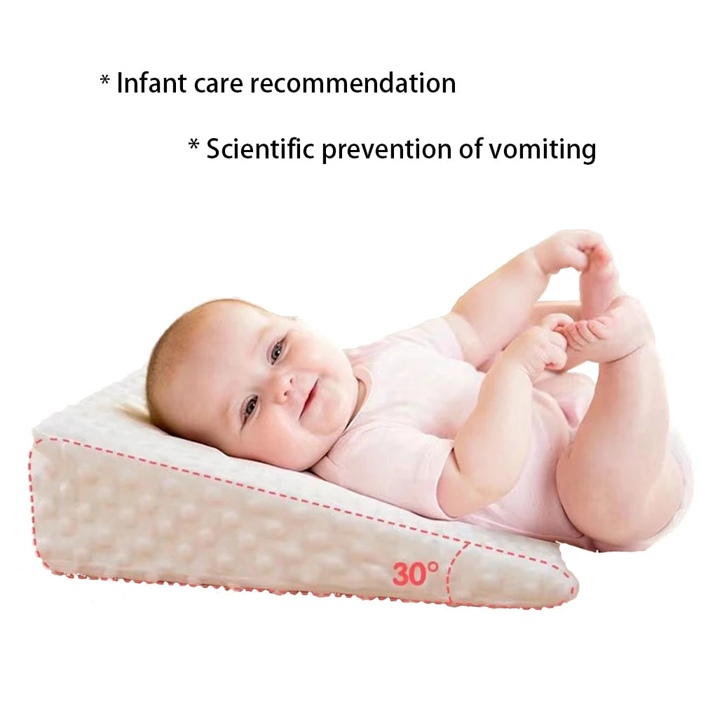 Baby anti vomit slope pillow with memory foam.