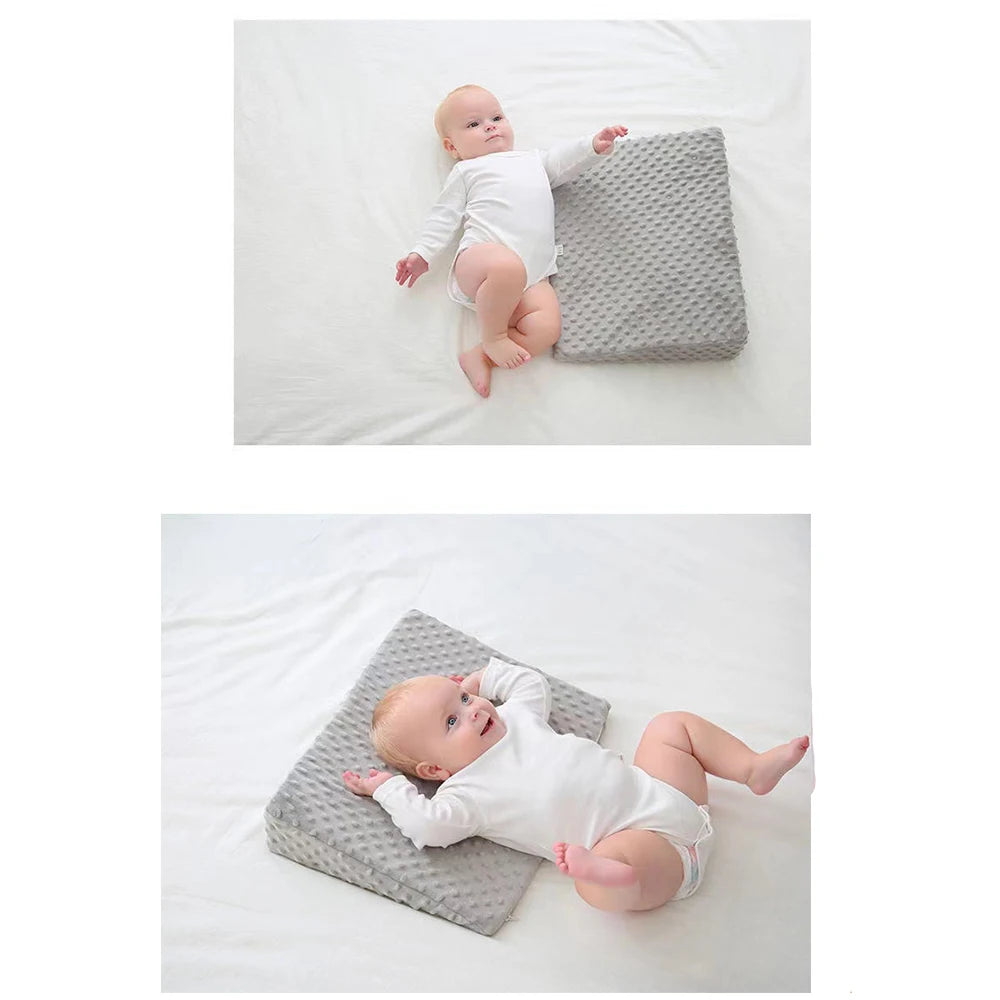 Baby anti vomit slope pillow with memory foam.