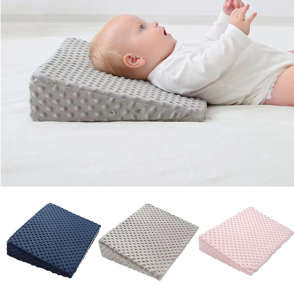 Baby anti vomit slope pillow with memory foam.