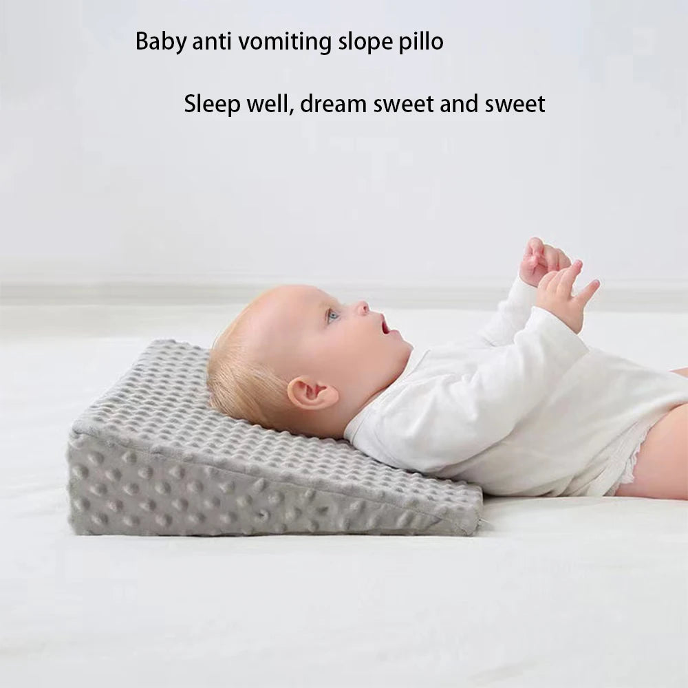 Baby anti vomit slope pillow with memory foam.