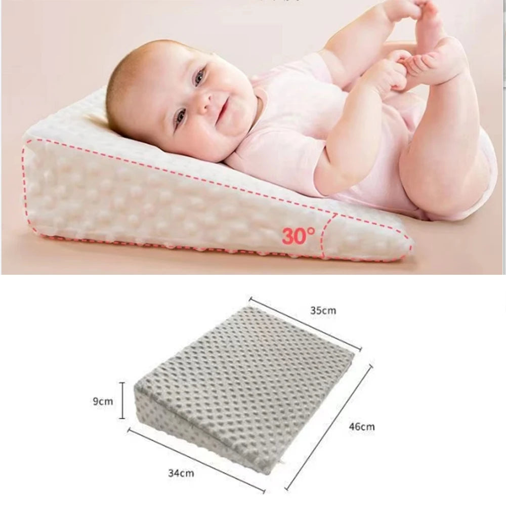 Baby anti vomit slope pillow with memory foam.